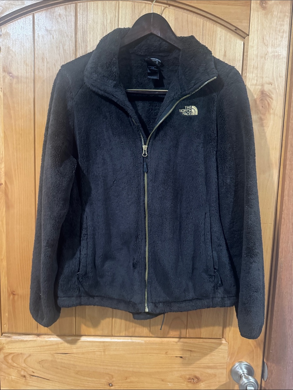 The North Face Black Teddy Jacket with Gold Logo